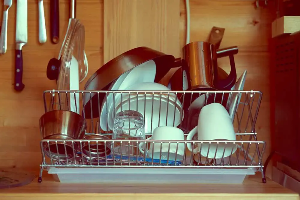 A clean stainless steel dish rack